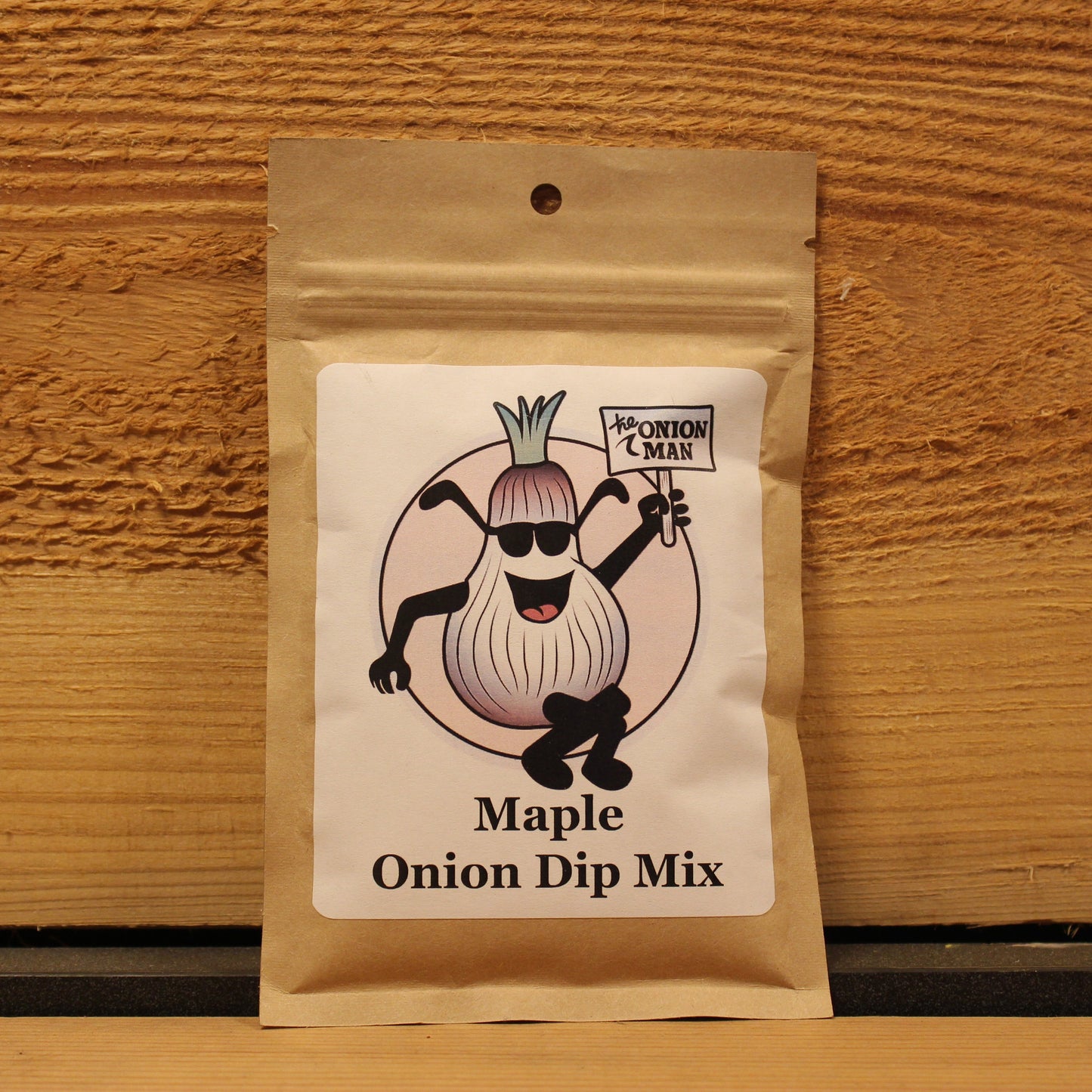 Package of Maple Onion Dip Mix on a wooden surface